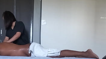 Spa girl massaging boy