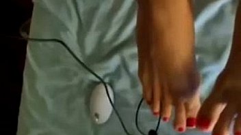 Sexy showing her tits and pussy from her bed