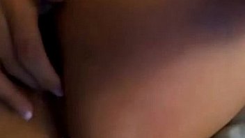 Sexy showing her tits and pussy from her bed