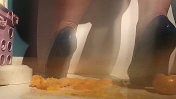 Sexy girl with lovely feet tramples sploshes her cookies