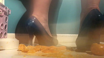 Sexy girl with lovely feet tramples sploshes her cookies