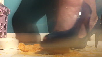 Sexy girl with lovely feet tramples sploshes her cookies