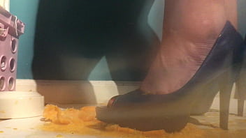 Sexy girl with lovely feet tramples sploshes her cookies