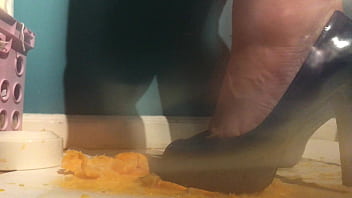 Sexy girl with lovely feet tramples sploshes her cookies