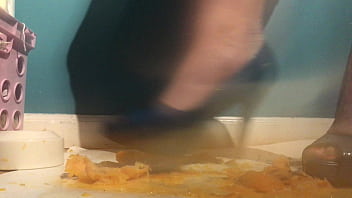 Sexy girl with lovely feet tramples sploshes her cookies