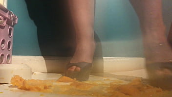 Sexy girl with lovely feet tramples sploshes her cookies