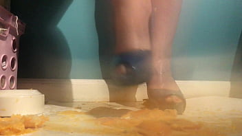 Sexy girl with lovely feet tramples sploshes her cookies