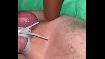 Tying his balls tight while i fist his ass