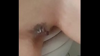 Cute nerdy girlfriend shaves her pussy