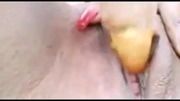 Noni playing with her toy