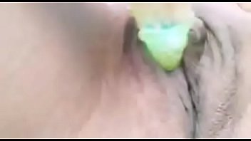 Noni playing with her toy