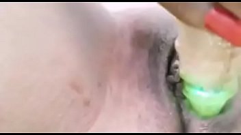 Noni playing with her toy