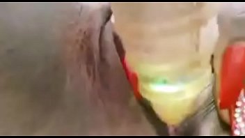 Noni playing with her toy