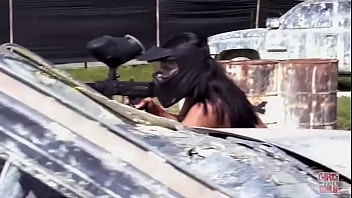 Sally squirts in the paintball arena