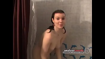 Watching naked redhead in shower smiling