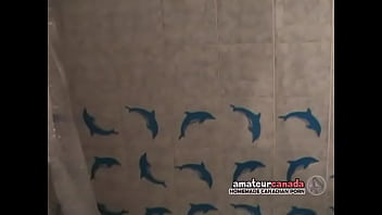 Watching naked redhead in shower smiling