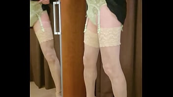 Man Wearing Different Brands Of Glamourous Lingerie And Models Them thumbnail