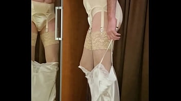 Man Wearing Different Brands Of Glamourous Lingerie And Models Them thumbnail