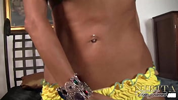 Tanned babe nikita von james inserts a hot vibrator inside her clam