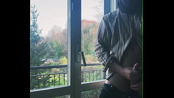 I jerk off in front of the window hoping someone sees me
