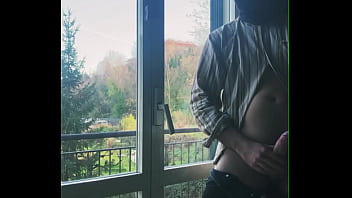 I jerk off in front of the window hoping someone sees me
