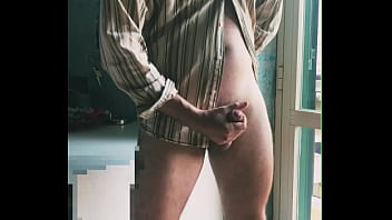 I jerk off in front of the window hoping someone sees me