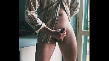 I jerk off in front of the window hoping someone sees me