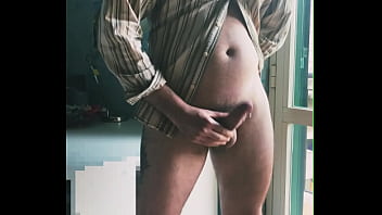 I jerk off in front of the window hoping someone sees me