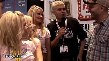 Charlie lynn rides bryan braxton's hard cock at the avn show