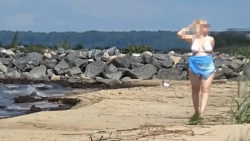 Hot mom on the beach in white swimsuit