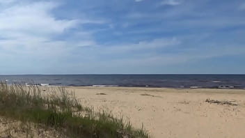 Hot mom on the beach in white swimsuit