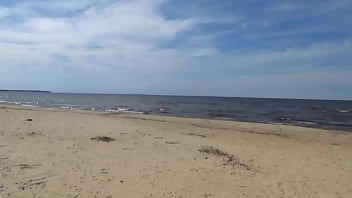 Hot mom on the beach in white swimsuit