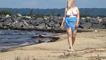 Hot mom on the beach in white swimsuit