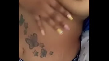 Playing wit her titties