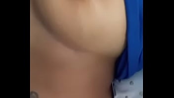 Playing wit her titties