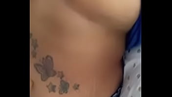 Playing wit her titties