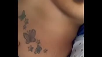 Playing wit her titties