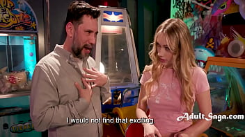 Stepdad and stepdaughter seize their alone time at the arcade