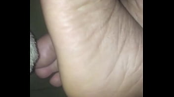 Her soles and a lil leg