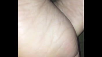 Her soles and a lil leg