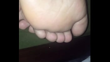 Her soles and a lil leg