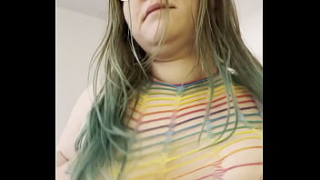 Rainbow clad joan day plays with herself and shakes big ass