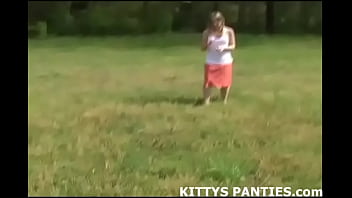 Cute kitty flashing her panties in public
