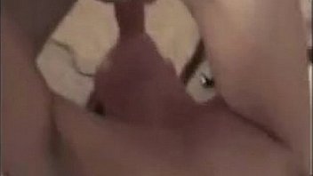 Double teaming a chick and cumming on her little titties