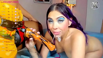 Sarina gives blowjobs to the strapon as if it were a cock