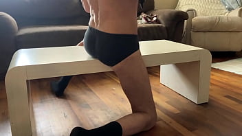 Preview of agressive myofascial pressure and release stretching on table in underwear with percussion massager