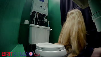 Horny nurse sucks cock at the gloryhole