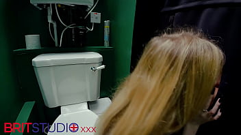 Horny nurse sucks cock at the gloryhole