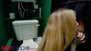 Horny nurse sucks cock at the gloryhole