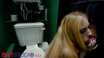 Horny nurse sucks cock at the gloryhole